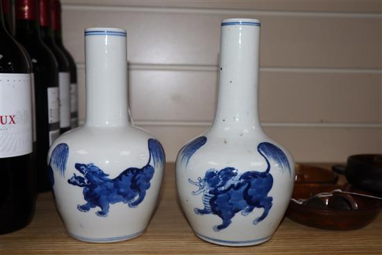 A pair of Chinese blue and white bottle vases tallest 22cm
